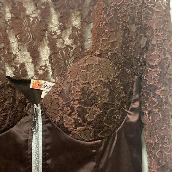 what ; brown ( on the top ) see thru design with flowers with zipper. its cute💫 - Picture 2 of 15